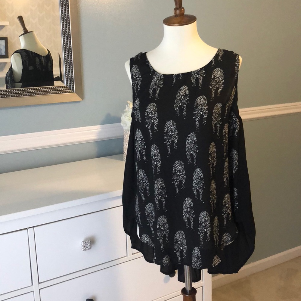 High low cheetah tank